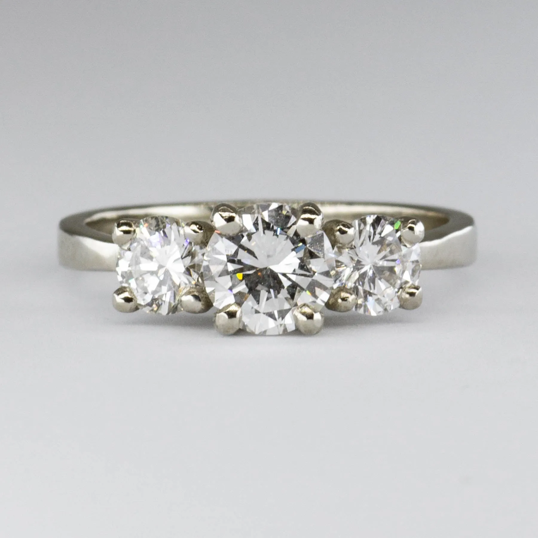 100 Ways Jewelry '100 Ways' GIA Certified Three Stone Diamond 18k Ring | 0.71 ctw SI1 E, 0.62 ctw | SZ 5.75