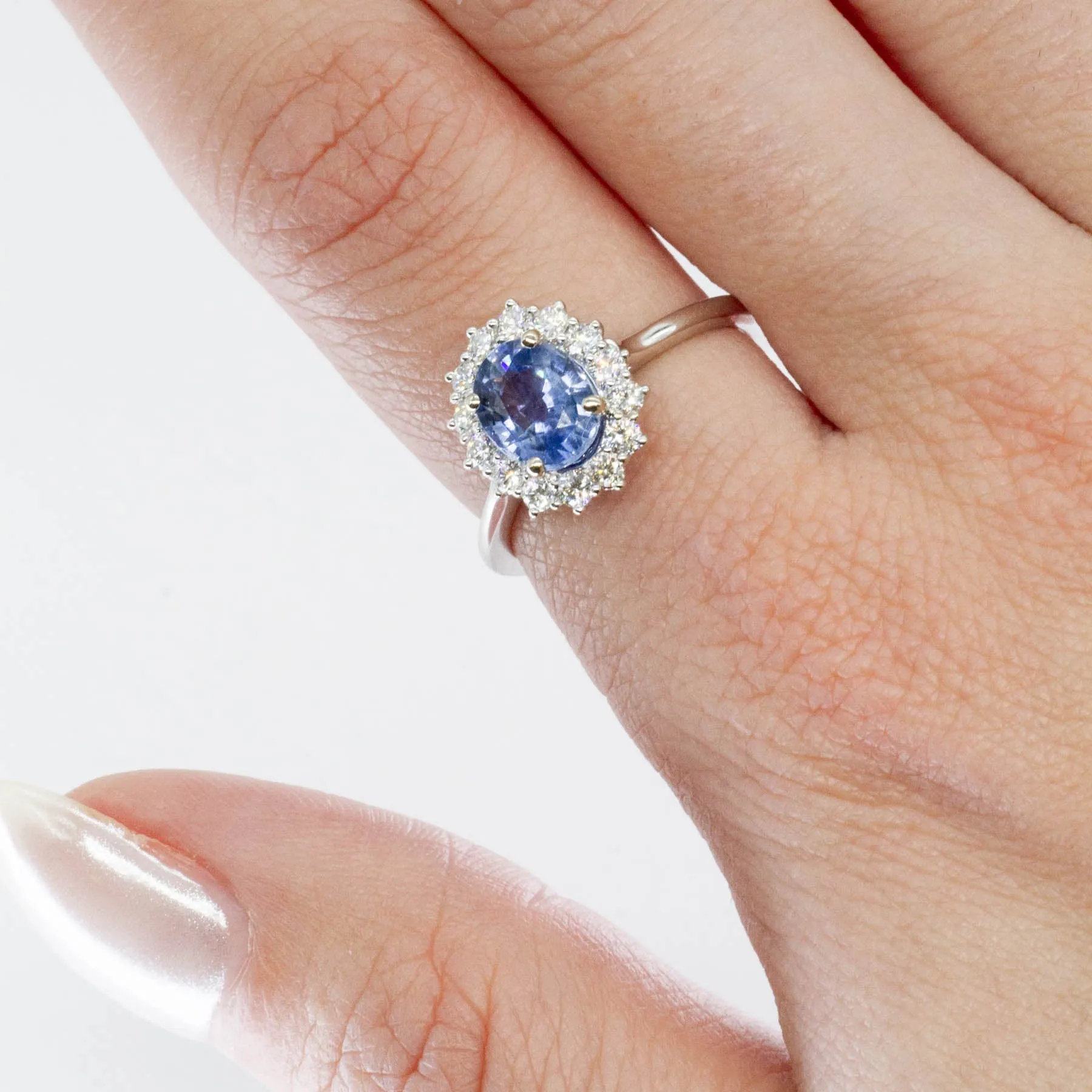 100 Ways Jewelry 100 Ways' Oval Sapphire and Halo Diamond Ring | 1.62ct, 0.38ctw | SZ 6.75 |