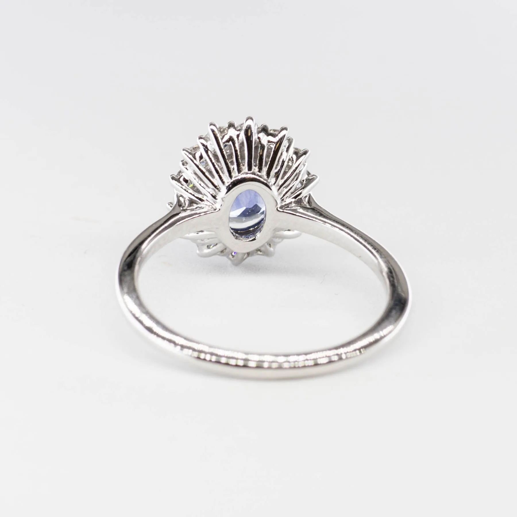 100 Ways Jewelry 100 Ways' Oval Sapphire and Halo Diamond Ring | 1.62ct, 0.38ctw | SZ 6.75 |