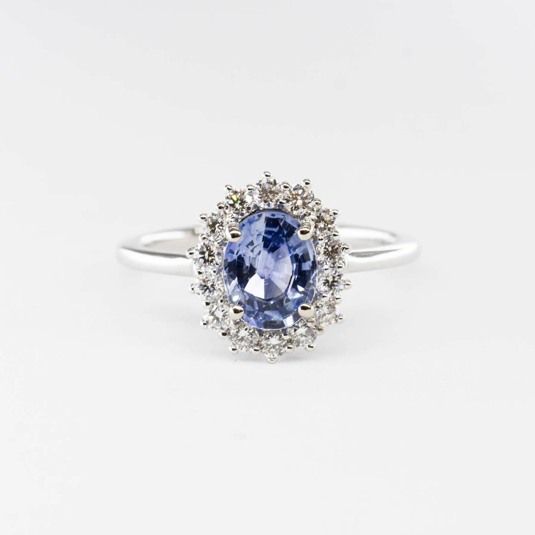 100 Ways Jewelry 100 Ways' Oval Sapphire and Halo Diamond Ring | 1.62ct, 0.38ctw | SZ 6.75 |