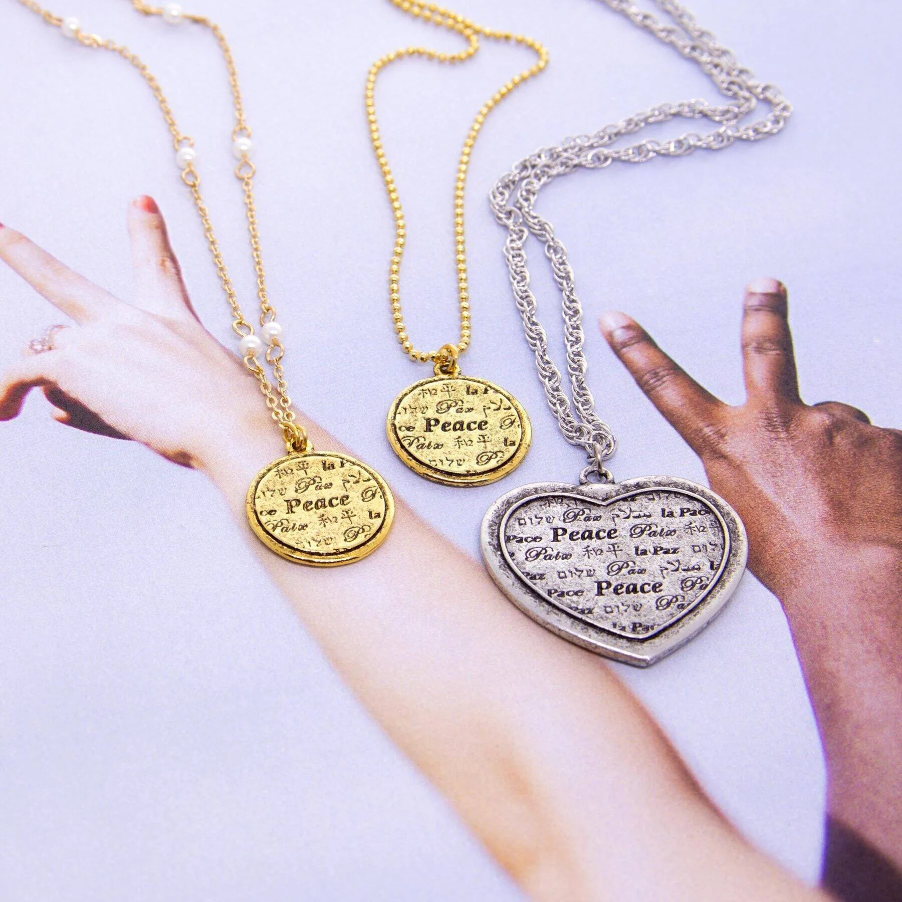 1928 Jewelry 3mm Faux Pearl Multilingual Peace Pendant Necklace 17"   3" Extension 1928 Jewelry